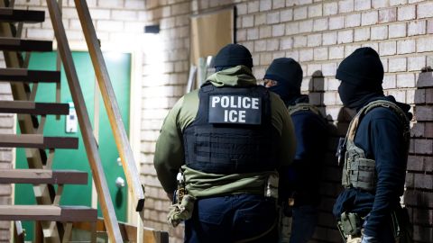 FILE - U.S. Immigration and Customs Enforcement officers wait to detain a person, Monday, Jan. 27, 2025, in Silver Spring, Md. (AP Photo/Alex Brandon, File)