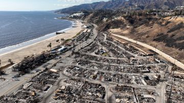 An aerial view shows the devastation left by the Palisades Fire in the Pacific Palisades section of Los Angeles, Monday, Jan. 27, 2025. (AP Photo/Jae C. Hong)