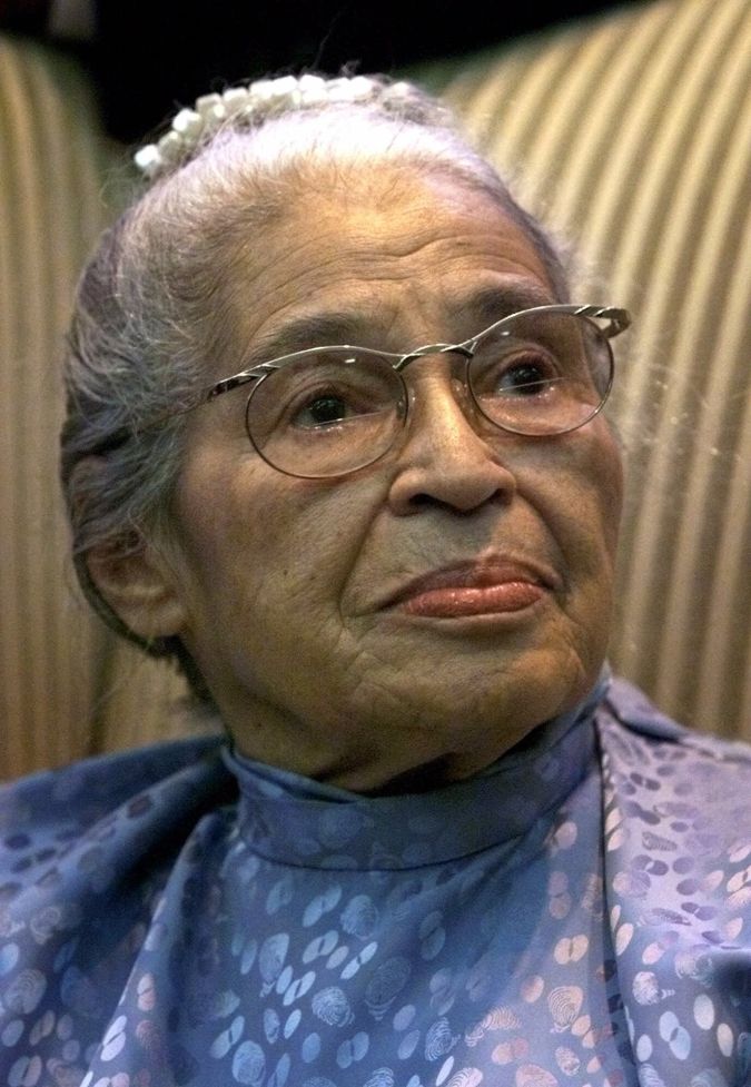 Civil rights pioneer Rosa Parks looks on during "A High Tea Celebration" in Washington Monday June 14, 1999, to honor her as a recipient of the 1999 Congressional Gold Medal. She will officially receive the medal Tuesday from President Clinton during a Capitol Hill ceremony. (AP Photo/Khue Bui)