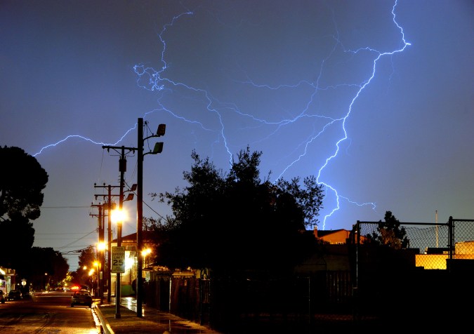 Lightning shoots through the sky in Arcadia, Calif., east of Los Angeles, early Monday morning Jan. 26, 2009. (AP Photo/Mike Meadows)