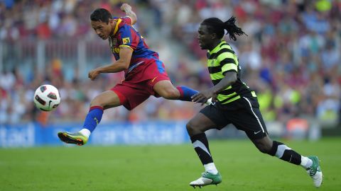 Royston Drenthe en un partido contra el FC Barcelona.