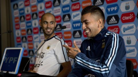 Argentina's Angel Correa, right, and Guido Pizarro, take part in press conference in Lima, Peru, Tuesday, Oct. 4, 2016. Argentina will face Peru in a World Cup qualifying soccer game in Lima, Thursday. (AP Photo/Rodrigo Abd)