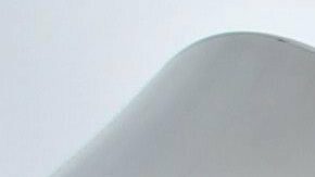 FILE - This July 15, 2012 file photo shows the Olympic rings displayed outside the basketball arena in the Olympic Park before the start of the 2012 Summer Olympics in London. NBC Universal and the LA Olympics are going into business together, combining to package commercial time on all the network's platforms with opportunities to sponsor the American team through 2028. The deal is for contracts covering 2021 through 2028, the year the Summer Games return to the United States for the first time in 32 years. (AP Photo/Jae Hong, file)