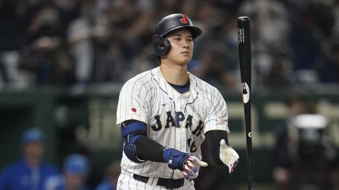 Shohei Ohtani of Japan reacts after a strike out during the eighth inning of the quarterfinal game between Italy and Japan at the World Baseball Classic (WBC) at Tokyo Dome in Tokyo, Japan, Thursday, March 16, 2023. (AP Photo/Toru Hanai)