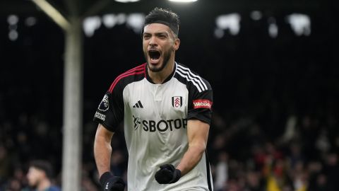 Fulham's Raul Jimenez celebrates after scoring his side's first goal during the English Premier League soccer match between Arsenal and Fulham at Craven Cottage stadium in London, Sunday, Dec. 31, 2023. (AP Photo/Alastair Grant)