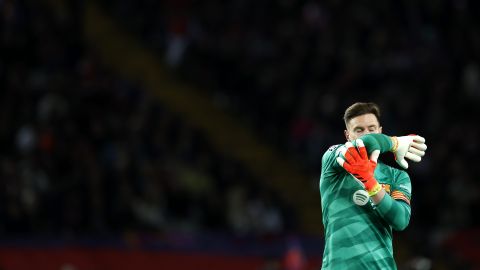 Barcelona's goalkeeper Marc-Andre ter Stegen walks on the pitch during the Champions League, round of 16, second leg soccer match between FC Barcelona and SSC Napoli at the Olympic Stadium in Barcelona, Spain, Tuesday, March 12, 2024. (AP Photo/Joan Monfort)