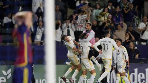 LA Galaxy forward Miguel Berry celebrates his game-tying goal against Real Salt Lake with teammates during the second half of an MLS soccer match Saturday, May 11, 2024, in Carson, Calif. (AP Photo/Ryan Sun)