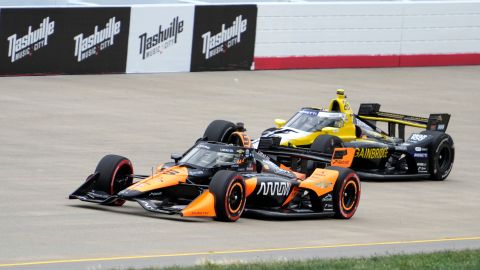 Pato O'Ward (5) and Colton Herta (26) drive during an IndyCar auto race Sunday, Sept. 15, 2024, at Nashville Superspeedway in Lebanon, Tenn. (AP Photo/Mark Humphrey)