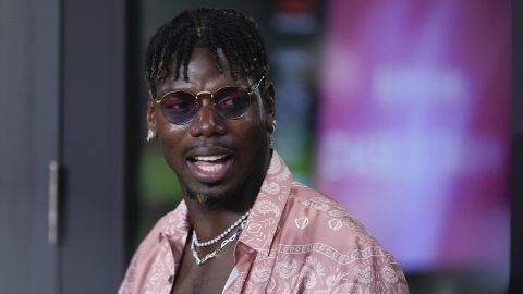 French professional soccer player Paul Pogba stands in a VIP suite at the start of an MLS soccer match between Inter Miami and Charlotte FC, Saturday, Sept. 28, 2024, in Fort Lauderdale, Fla. (AP Photo/Rebecca Blackwell)