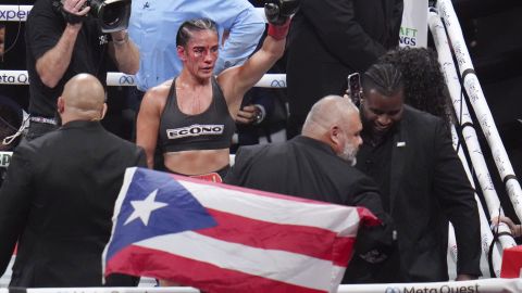 Amanda Serrano reacts after fighting Katie Taylor in an undisputed super lightweight title bout, Friday, Nov. 15, 2024, in Arlington, Texas. (AP Photo/Julio Cortez)