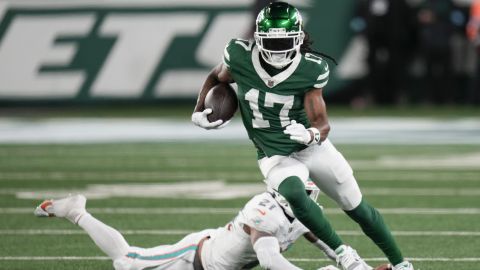 New York Jets' Davante Adams (17) runs with the ball during an NFL football game against the Miami Dolphins, Sunday, Jan. 5, 2025, in East Rutherford, N.J. (AP Photo/Seth Wenig)