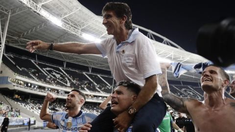 Coach Gustavo Costas of Argentina's Racing Club celebrates winning the Recopa Sudamericana final soccer match against Brazil's Botafogo in Rio de Janeiro, Thursday, Feb. 27, 2025. (AP Photo/Bruna Prado)