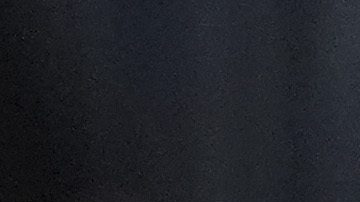 Denver Nuggets center Nikola Jokic, left, drives to the basket as Phoenix Suns center Mason Plumlee defends in the second half of an NBA basketball game Friday, March 7, 2025, in Denver. (AP Photo/David Zalubowski)