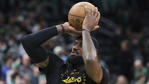 Los Angeles Lakers forward LeBron James warms up before an NBA basketball game against the Boston Celtics, Saturday, March 8, 2025, in Boston. (AP Photo/Mark Stockwell)