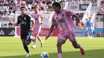 Inter Miami midfielder Telasco Segovia (8) runs with the ball during the first half of an MLS soccer match against Charlotte FC, Sunday, March 9, 2025, in Fort Lauderdale, Fla. (AP Photo/Lynne Sladky)