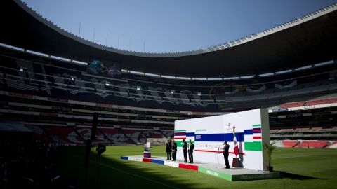 FILE - From left, Mexico Secretary of Tourism Enrique de la Madrid, President of the Mexican Football Federation Decio de Maria, Director for the Mexico World Cup candidacy Yon de Luisa, Secretary General of the Mexican Football Federation Guillermo Cantu, listen to Mexico's Interior Secretary Alfonso Navarrete Prida during the presentation of the guarantees for Mexico's bid for the 2026 Soccer World Cup, at the Estadio Azteca in Mexico City, Feb. 16, 2018. (AP Photo/Eduardo Verdugo, File)