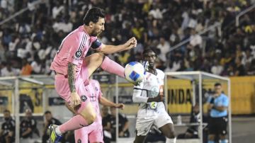 Inter Miami forward Lionel Messi controls the ball during a CONCACAF Champions Cup soccer match against Jamaica's Cavalier in Kingston, Jamaica, Thursday, March 13, 2025. (AP Photo/Collin Reid)