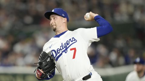 Los Angeles Dodgers pitcher Blake Snell (7) works against the Hanshin Tigers during the first inning in an MLB Japan Series exhibition baseball game, Sunday, March 16, 2025, in Tokyo. (AP Photo/Hiro Komae)