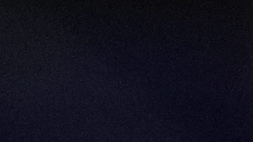 Barcelona's Dani Olmo grimaces in pain during a La Liga soccer match between Atletico Madrid and FC Barcelona at the Metropolitano stadium in Madrid, Sunday, March 16, 2025. (AP Photo/Bernat Armangue)