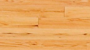 FILE - The Boston Celtics logo is seen at center court on the parquet floor before an NBA basketball game between the Boston Celtics and the Atlanta Hawks Sunday, Feb. 13, 2022, in Boston. (AP Photo/Winslow Townson, File)