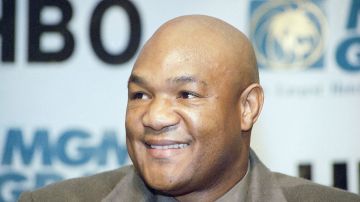 FILE - Former heavyweight champion George Foreman of Houston, reacts during a news conference in Las Vegas, Wednesday, Nov. 2, 1994.(AP Photo/Lennox McLendon, File)