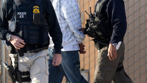 In this March 30, 2012 photo, Immigration and Customs Enforcement (ICE) agents take a suspect into custody as part of a nationwide immigration sweep in Chula Vista, Calif. Federal officials say they arrested more than 3,100 immigrants convicted of serious crimes and fugitives in a six-day nationwide sweep. Officials at U.S. Immigration and Customs Enforcement say the sweep included every state and involved more than 1,900 of the agencys officers and agents. (AP Photo/Gregory Bull)