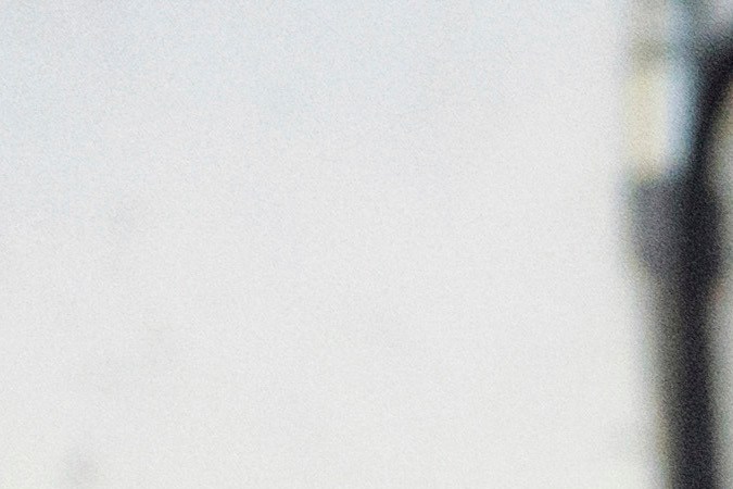 FILE - An electric vehicle is charged at a parking garage in Los Angeles, Oct. 17, 2018. (AP Photo/Richard Vogel, File)