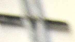 FILE - In this Nov. 14, 2013 file photo, a corrections officer stands near a gate at Baltimore City Detention Center in Baltimore. Inside the Baltimore City Detention Center, gang members used smuggled cellphones, dealt drugs and had sex with corrupt guards  several of whom they impregnated  who helped them as they ran operations of the Black Guerilla Family, according to court papers in a case alleging widespread corruption at the state-run facility. (AP Photo/Steve Ruark, FIle)