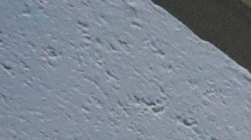In this Wednesday, Aug. 28, 2019, photo shows a guard standing in the intake area at the Adelanto ICE Processing Center in Adelanto, Calif. The facility is a privately operated immigration detention center run by the GEO Group, which can house up to about 1900 total immigrant detainees, both male and female. (AP Photo/Chris Carlson)