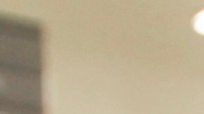 Cashier Denise Cruz checks out customers' purchases at a hardware store in Los Angeles Tuesday, Oct. 4, 2011. Service firms that employ 90 percent of the U.S. work force grew at a slower pace in September, evidence that the economy is growing but at a sluggish pace. (AP Photo/Reed Saxon)