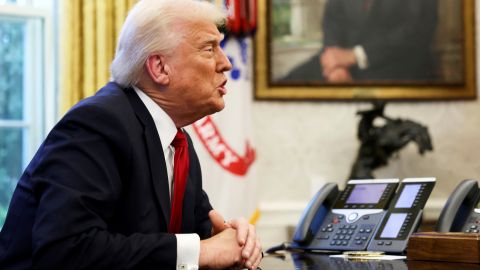 President Donald Trump speaks to reporters in the Oval Office at the White House in Washington, Wednesday, March 26, 2025. (Pool via AP)