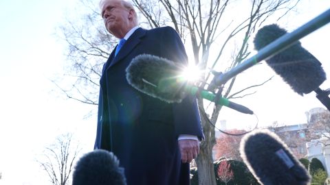 President Donald Trump speaks with reporters before departing the White House, Friday, March 21, 2025, in Washington, en route to New Jersey. (AP Photo/Jacquelyn Martin)