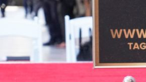 Gal Gadot poses with her new star at a ceremony honoring her on the Hollywood Walk of Fame on Tuesday, March 18, 2025, in Los Angeles. (Photo by Jordan Strauss/Invision/AP)