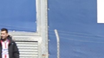 Getafe y Atlético de Madrid durante el minuto de silencio antes del partido.