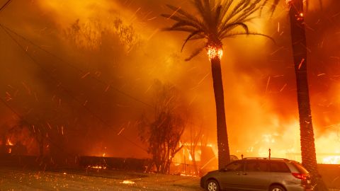 Winds blow embers from the Eaton Fire in Altadena, Calif., Wednesday, Jan. 8, 2025. (AP Photo/Nic Coury)