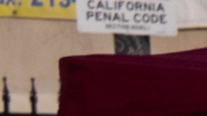 A homeless person sleeps on a sidewalk in Los Angeles, Friday, Sept. 15, 2023. (AP Photo/Jae C. Hong)