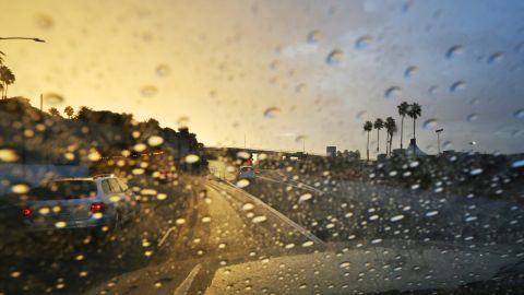 Rain from a storm cell soaks Pacific Coast Highway at it approaches the McClure Tunnel, left, near the pier in Santa Monica, Calif., right, as one of a series of storms sweeps through California Friday, Oct. 28, 2016. (AP Photo/Reed Saxon)