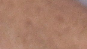 FILE - A handcuffed man, arrested for alleged gang connections, waits to be transferred to a prison at the police delegation of San Bartolo in Soyapango, El Salvador, Aug. 16, 2022. Congress voted on Dec. 14 to extend President Nayib Bukele’s emergency powers to crack down on gangs for the ninth time. (AP Photo/Salvador Melendez, File)