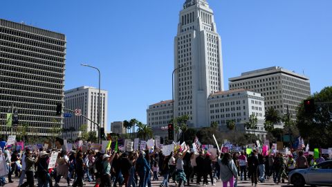 Demonstrators march towards Los Angeles City Hall during a march to commemorate International Women's Day Saturday, March 8, 2025, in Los Angeles. (AP Photo/William Liang)