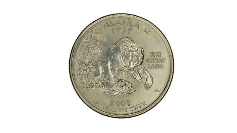 Moneda de 25 centavos de Alaska con un oso pardo