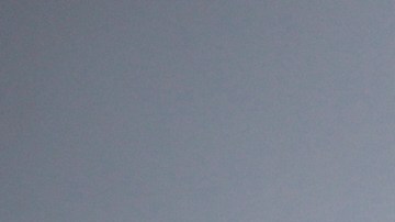 A fire-damaged beachfront property is seen in the Palisades Fire zone during a storm Thursday, Feb. 13, 2025, in Malibu, Calif. (AP Photo/Ethan Swope)