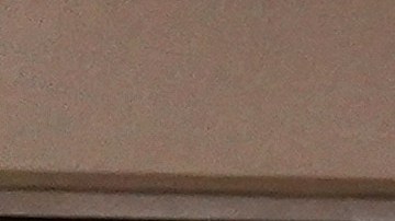 Respiratory therapist Paul Knaack, left, and Dr. Mher Onanyan check on a COVID-19 patient in an intensive care unit at Providence Holy Cross Medical Center in the Mission Hills section of Los Angeles, Tuesday, Dec. 22, 2020. (AP Photo/Jae C. Hong)