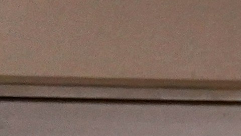 Respiratory therapist Paul Knaack, left, and Dr. Mher Onanyan check on a COVID-19 patient in an intensive care unit at Providence Holy Cross Medical Center in the Mission Hills section of Los Angeles, Tuesday, Dec. 22, 2020. (AP Photo/Jae C. Hong)