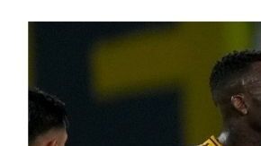 Coach Fernando Gago of Argentina's Boca Juniors, right, together with his players leave the field at the end of the first half of a Copa Libertadores soccer match against Peru's Alianza Lima at La Bombonera stadium in Buenos Aires, Argentina, Tuesday, Feb. 25, 2025. (AP Photo/Gustavo Garello)