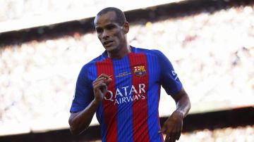 Former FC Barcelona player Rivaldo runs during a friendly soccer match between FC Barcelona legends and Manchester United legends at the Camp Nou stadium in Barcelona, Spain, Friday, June, 30, 2017. (AP Photo/Manu Fernandez)