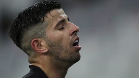 Pablo Ceppelini of Uruguay's Penarol reacts after failing to score on a penalty shot against Brazil's Athletico Paranaense during a Copa Sudamericana semifinal soccer match in Curitiba, Brazil, Thursday, Sept. 30, 2021. (Heuler Andrey/Pool via AP)