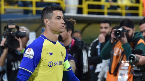 Al Nassr's Cristiano Ronaldo enters the pitch to play the Saudi Pro League match between Al Ettifaq FC and Al Nassr FC at Mrsool Park Stadium, in Riyadh, Saudi Arabia, Sunday, Jan. 22, 2023. (AP Photo)
