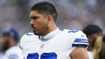 Dallas Cowboys offensive tackle Isaac Alarcon walks on the sideline during a preseason NFL football game against the Seattle Seahawks, Saturday, Aug. 19, 2023, in Seattle. (AP Photo/Lindsey Wasson)