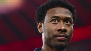 Real Madrid's David Alaba stands on the pitch prior the start of the Champions League semifinal first leg soccer match between Bayern Munich and Real Madrid at the Allianz Arena in Munich, Germany, Tuesday, April 30, 2024. (AP Photo/Christian Bruna)