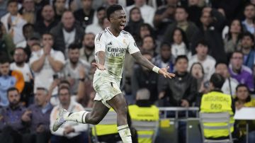 Real Madrid's Vinicius Junior reacts during the Spanish Copa del Rey semifinal second leg soccer match between Real Madrid and and Real Sociedad in Madrid, Spain Tuesday, April 1, 2025. (AP Photo/Bernat Armangue)
